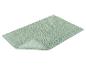 Tapis de bain vert clair texturé.