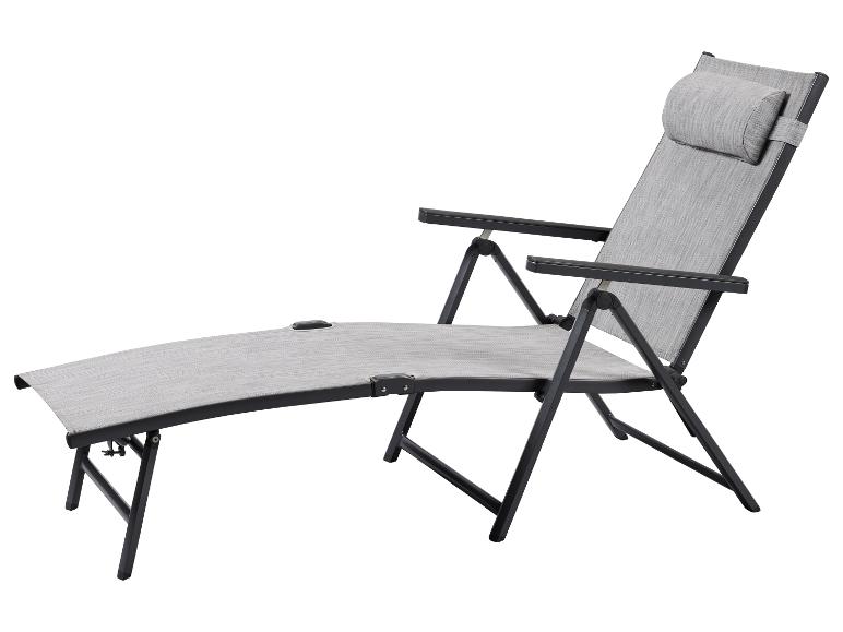 Chaise longue pliante grise avec dossier réglable et coussin de tête.