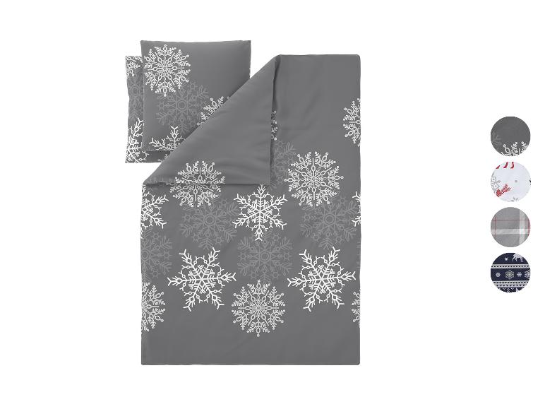 Parure de lit grise avec flocons de neige blancs, avec options de design supplémentaires.