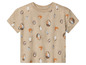 T-shirt beige pour bébé avec un imprimé de petits pains, de fruits et de confiture.