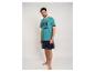 Pyjama homme avec t-shirt turquoise imprimé palmiers et short bleu.