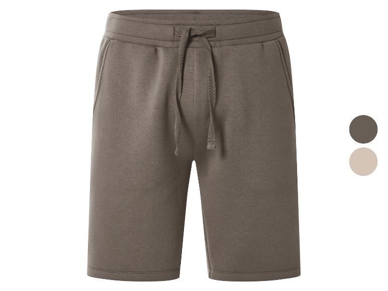 Shorts de survêtement marron avec cordon de serrage ajustable, présentés avec des échantillons de couleur marron et beige.