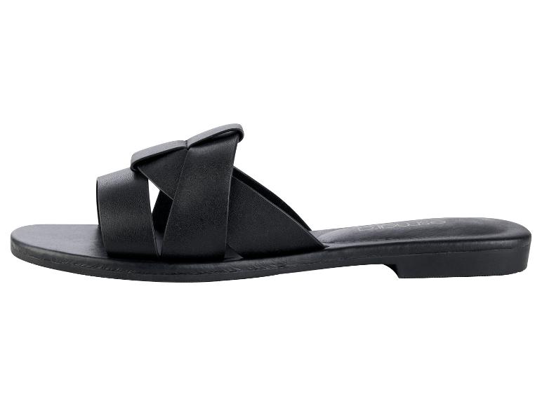 Sandales noires à brides croisées, style minimaliste.