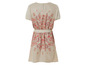 Robe beige à manches courtes avec un imprimé floral.
