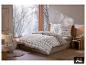 Drap-housse en polaire LIVARNO home sur un lit dans une chambre chaleureuse au thème hivernal. [image générée par l'IA]