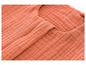 Gros plan sur un tissu doux en coton rose.