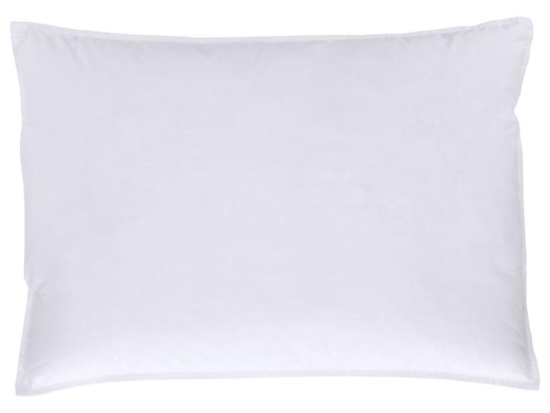 Oreiller blanc en tissu lisse, offrant confort et soutien.