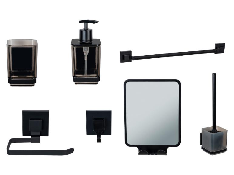 Ensemble d'accessoires de salle de bain noirs modernes : distributeur de savon, porte-brosse à dents, miroir, porte-papier toilette et porte-brosse de toilette.