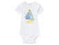Body blanc avec un motif de bateau et le texte 'Very first voyage'.