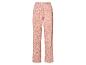 Pantalon de pyjama rose poudré à motif feuilles.