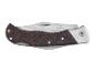 Couteau pliant Crivit avec manche en bois foncé.