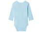 Un body bébé à manches longues de couleur bleu clair.