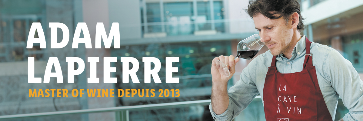 Adam Lapierre, Master of Wine depuis 2013, dégustant du vin.
