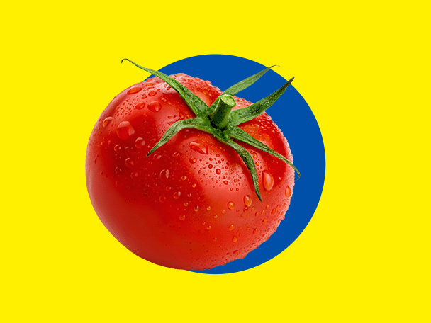 Une tomate rouge fraîche avec des gouttelettes d'eau, sur fond jaune avec un cercle bleu.