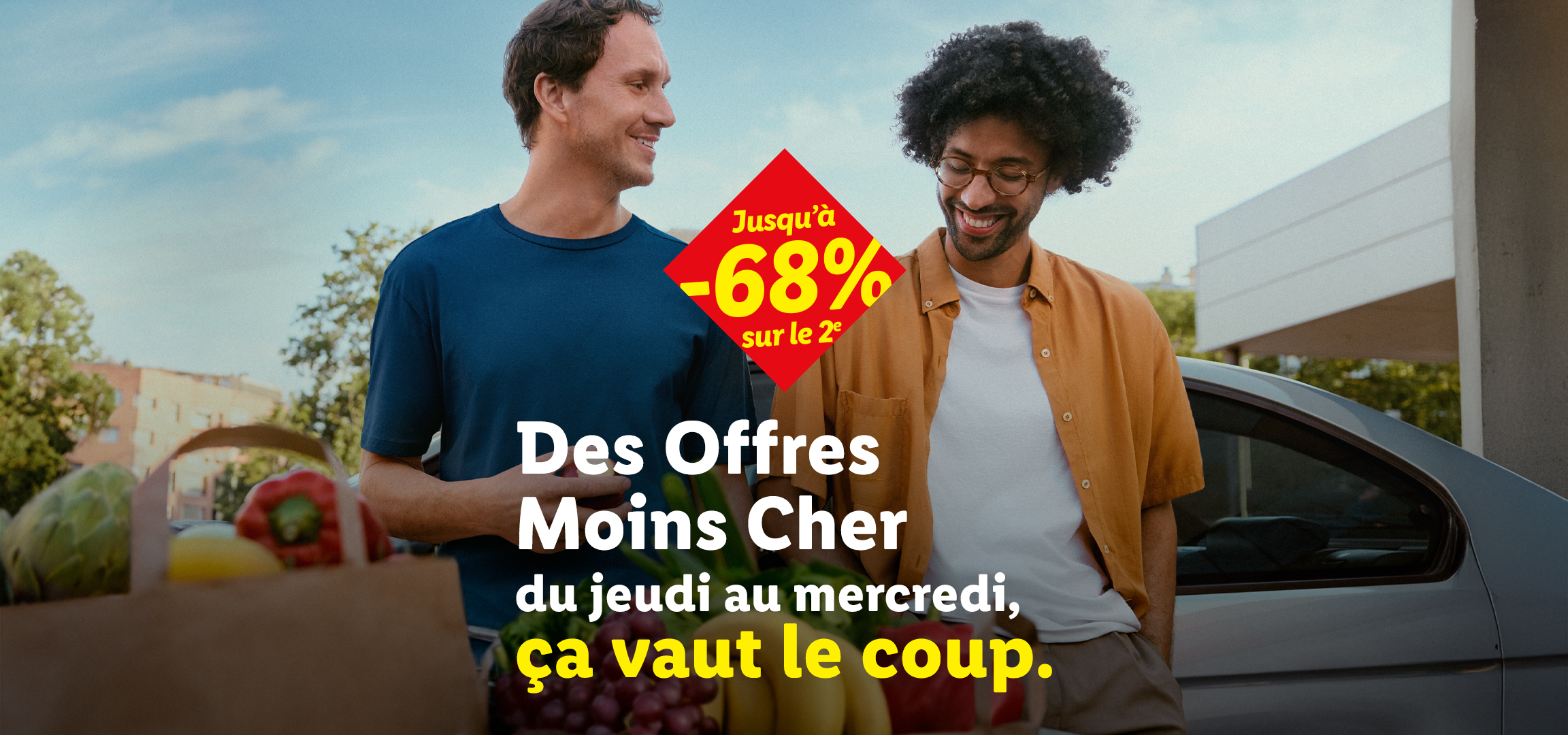 Deux hommes souriants avec le texte 'Des Offres Moins Cher chez Lidl, ça vaut le coup' et 'Jusqu'à -68% sur le 2e'.