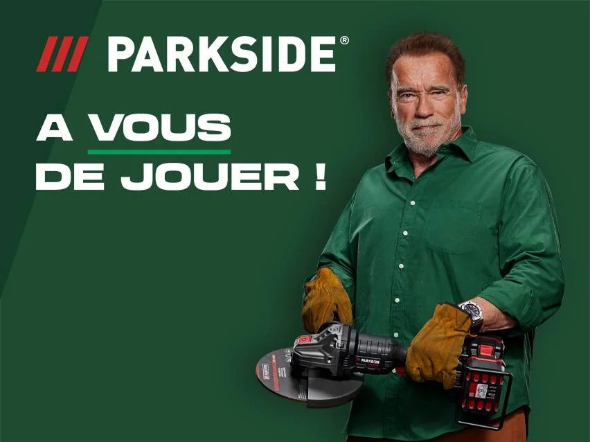 Arnold Schwarzenegger tenant une meuleuse d'angle Parkside, avec le texte 'À vous de jouer !'